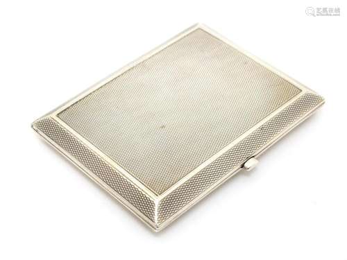 A silver cheroot / cigarillo case with engine turned decorat...