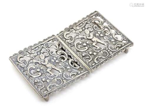 A silver two part belt buckle hallmarked Birmingham 1977, ma...