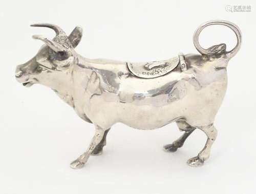 A 19thC Continental silver cow creamer with import marks for...