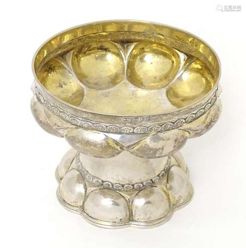 A silver and silver gilt cup / chalice with Arts & Craft...