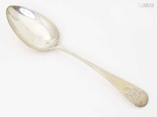 A Geo III silver Old English pattern table spoon, hallmarked...