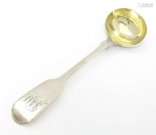 A William IV silver Fiddle pattern salt spoon with gilded bo...