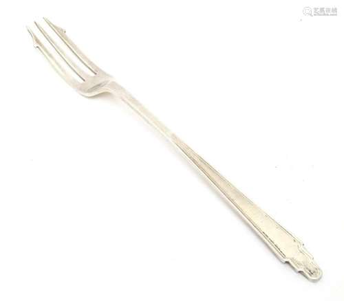 An Art Deco silver pickle fork hallmarked Sheffield 1942, ma...