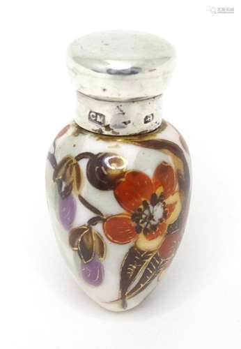 A late 19thC scent / perfume bottle with hand painted decora...