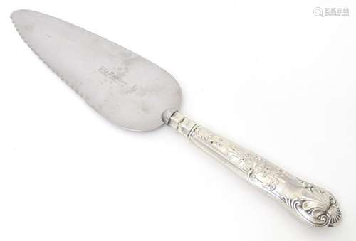 A silver handled King's pattern pie slicer, hallmarked S...