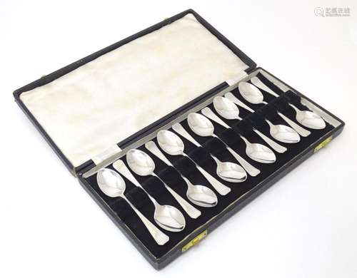 A set of twelve silver teaspoons hallmarked Sheffield 1944, ...