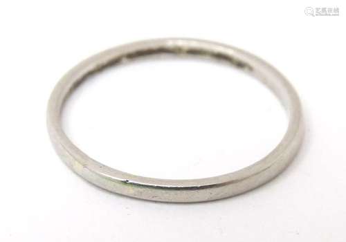 A platinum band. Ring size approx N