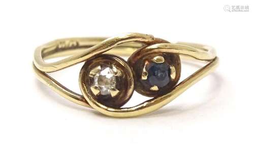 A 9ct gold ring set with sapphire and diamond. Ring size app...