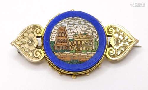 A yellow metal brooch set with micro mosaic detail. 1 3/4&qu...