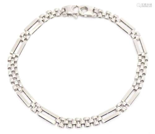 A 9ct white gold bracelet. 7 1/2" long