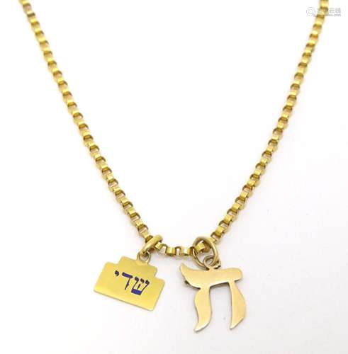 Judaica : A yellow metal chain set with two pendants compris...