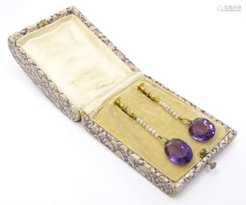 A pair of 9ct gold drop earrings set with amethyst and seed ...