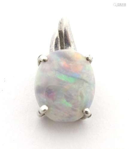 A silver pendant set with opalescent cabochon. Approx. 1/2&q...