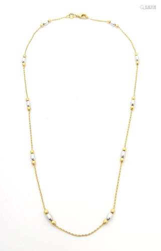 A 9ct gold necklace. Approx. 16" long