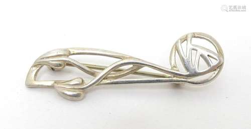 A silver brooch inspired by the work of Charles Rennie macki...