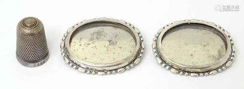 A pair of silver brooches with locket section to front hallm...