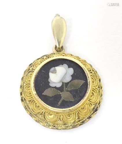 A yellow metal pendant set with pendant with pietra dura det...