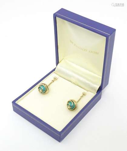 A pair of 9ct gold drop earrings set with turquoise. Approx ...