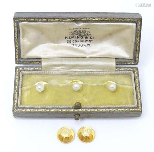 A pair of 9ct gold studs together with three 18ct gold and y...