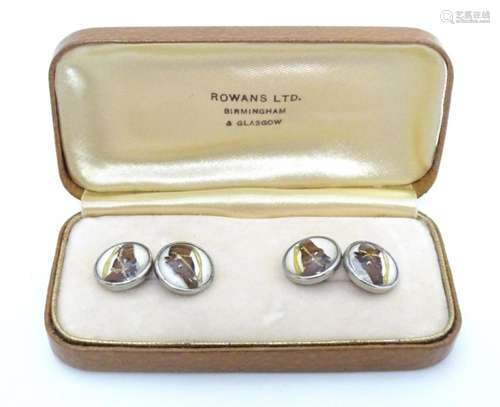 A pair of cufflinks set with Essex Crystal cabochon with hor...