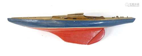 Toy: A 20thC scratch built wooden model of a boat / pond yac...