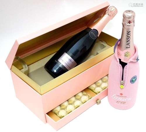 Champagne : Two 750ml bottles of rose champagne comprising a...