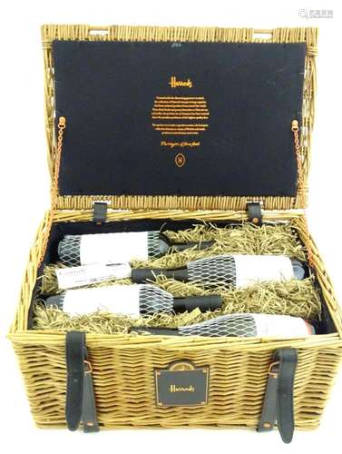 Wine : A Harrods wicker hamper containing four bottles of Ha...