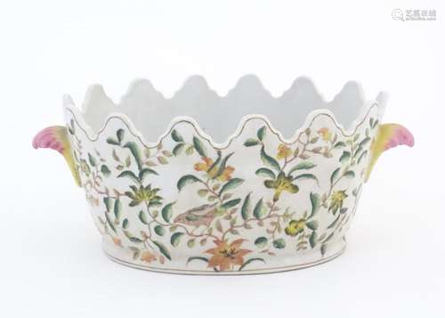 A Chinese planter / jardiniere with shaped rim and twin foli...