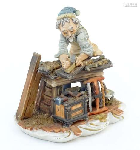 An Italian Capodimonte model of a Carpenter, and signed Mili...