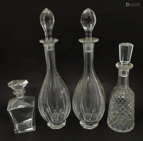 Four 19thC and later glass decanters and stoppers. Largest a...