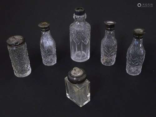 Assorted silver mounted bottles to include cut glass cruet b...