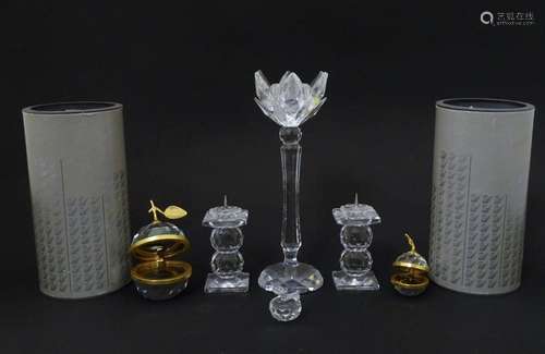 A quantity of Swarovski items to include candlestick, apples...