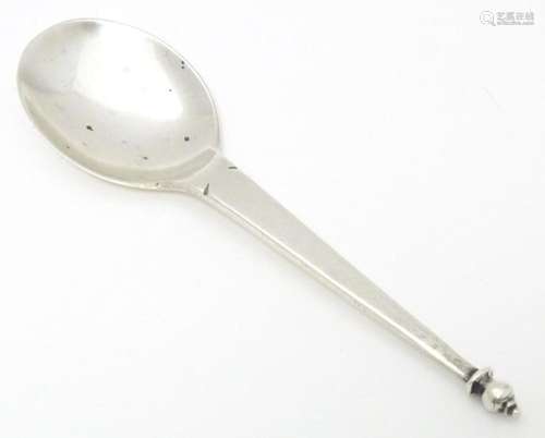 An Arts & Crafts silver spoon, hallmarked London 1906, m...