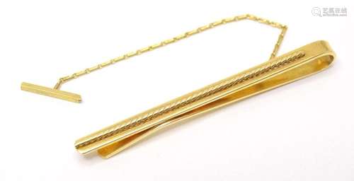 A 9ct gold tie pin. Approx. 2" long