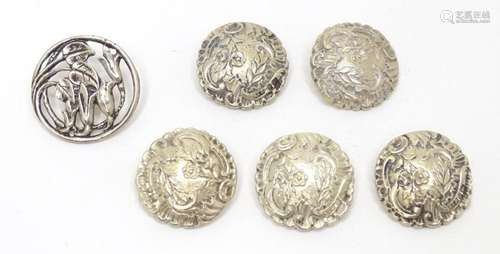 Five .930 Continental silver buttons with floral foliate and...