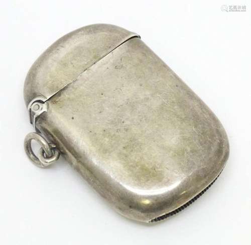 A silver vesta case hallmarked Birmingham 1905, maker Miller...