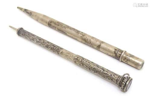 A sterling silver propelling pencil, together with another w...