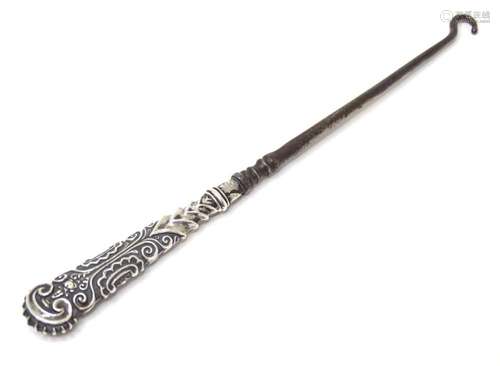 A silver handled button hook, hallmarked Birmingham c. 1895....