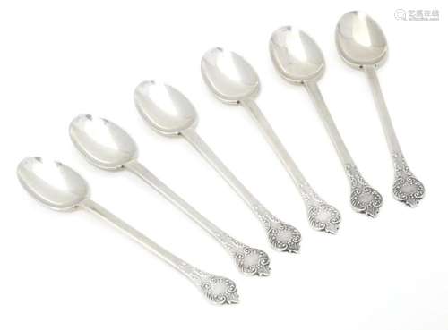 A set of six silver coffee spoons hallmarked Sheffield 1930,...