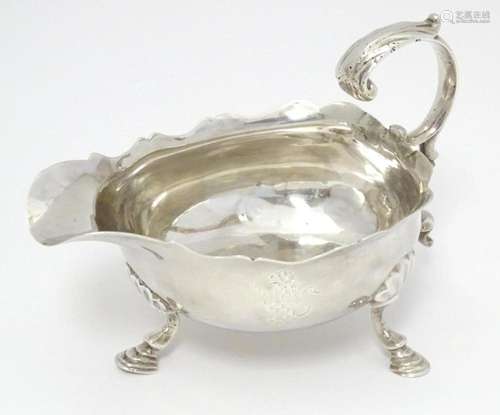 A silver sauce boat hallmarked London 1754. Approx. 6" ...