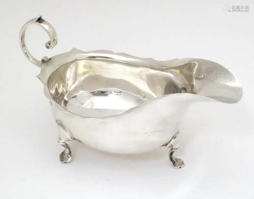 An early 20thC silver sauceboat. Hallmarked Chester 1915 mak...