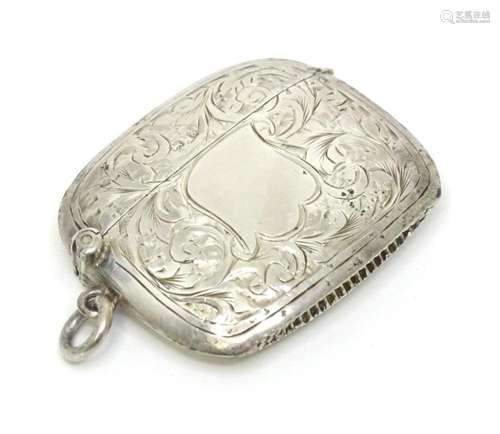 A silver vesta case with engraved decoration, hallmarked Bir...