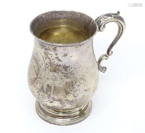 A Victorian silver tankard hallmarked Exeter 1877, maker Jos...