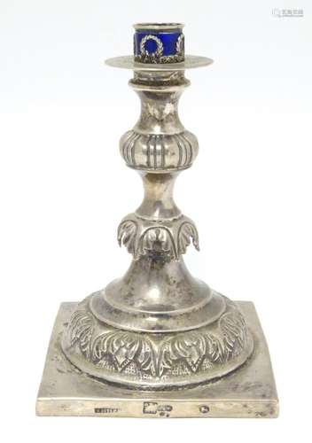 A 19thC Russian silver candlestick with enamel decoration to...