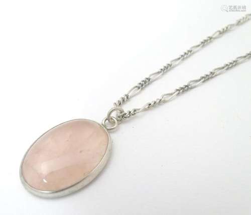 A silver pendant set with rose quartz cabochon, Hallmarked L...