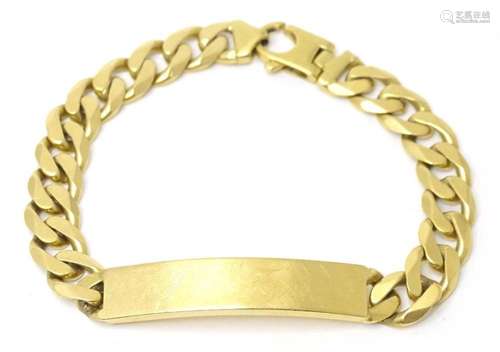 An 18ct gold gentleman's identity bracelet. Approx 8 1/2...