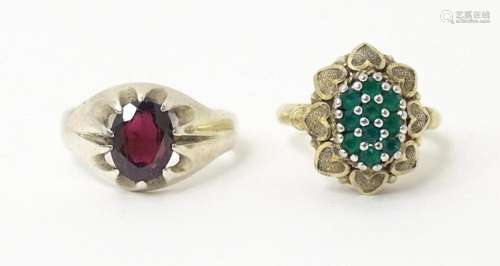 A silver ring set with purple stone ( Ring size approx. Q) T...