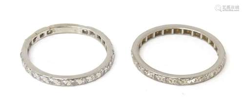 Two platinum diamond eternity rings (2)