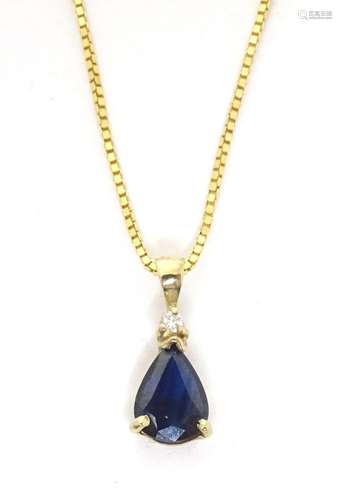 An 18ct gold box chain necklace with yellow metal pendant se...