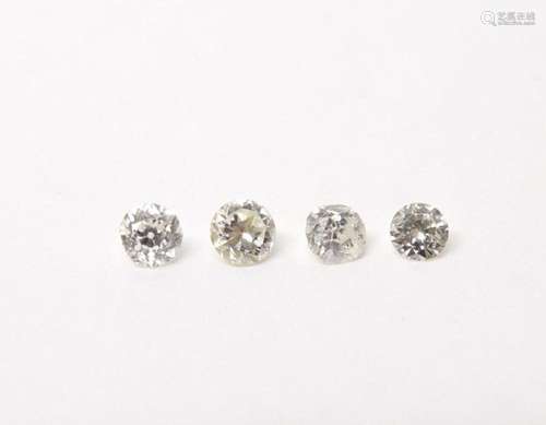 Loose unset stones: Four round brilliant cut diamonds. Appro...